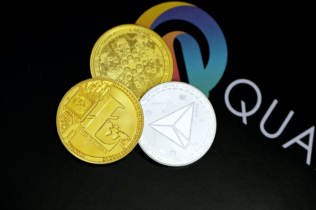 null - Litecoin, Cardano coin, and Tron coin are together on the Quantitatives logo, tags: provider ego.com record - unsplash