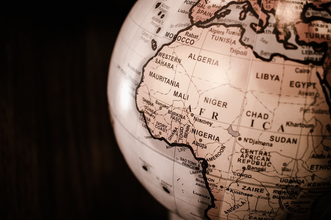 white and brown desk globe - Africa on the globe, tags: metaverse $3.2 million expand gaming - unsplash