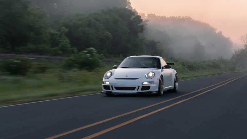 white porsche 911 on road during daytime - Porsche 911 GT3 rolling shot, tags: nft - unsplash